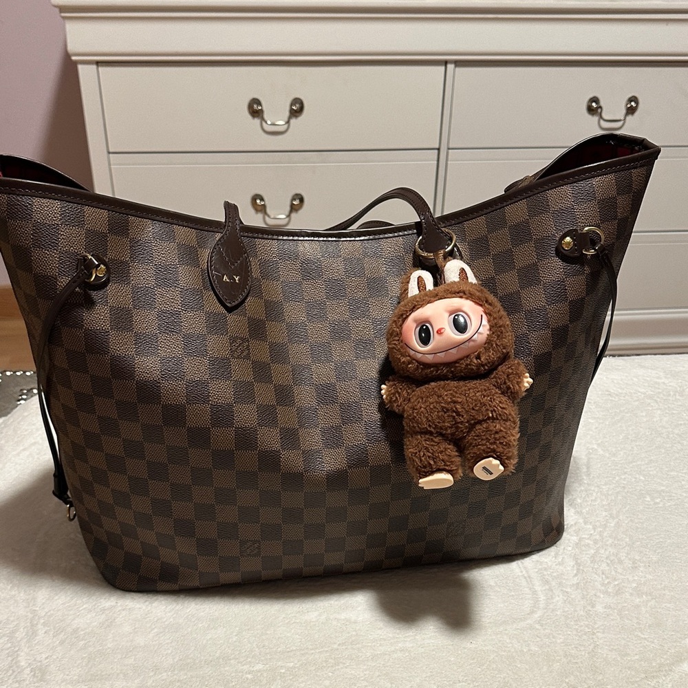 Louis Vuitton Brown Damier Ebene Tote with Brown Plush Charm: authentic.